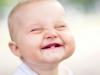 When do babies first teeth appear?